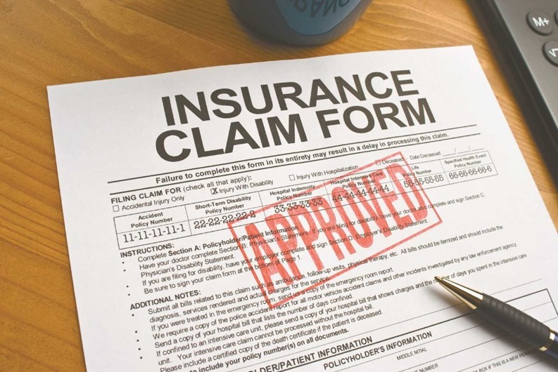 Insurance claim form approved after documentation assistance from Brown's Roofing Fayetteville