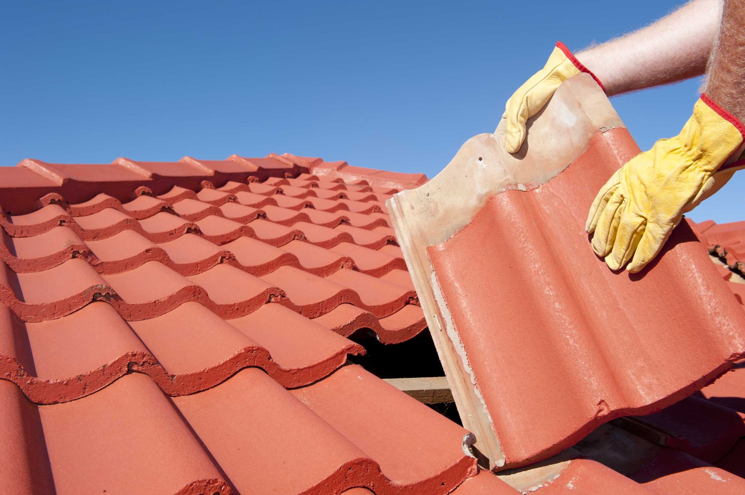 tiles being installed on roof