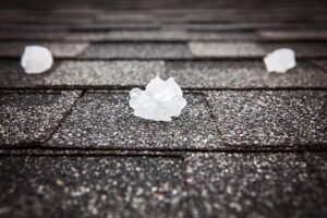 Hail hitting an asphalt roof,