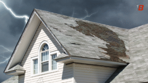 Storm damaged roof with missing asphalt shingles