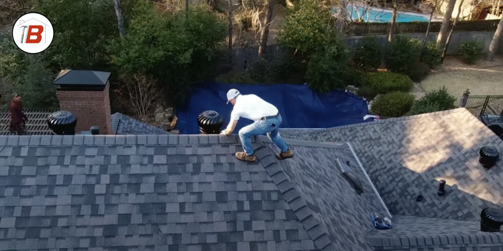 Insurance adjustor on a roof