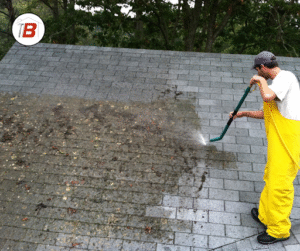 Roof rejuvenation being conducted on a shingle roof.