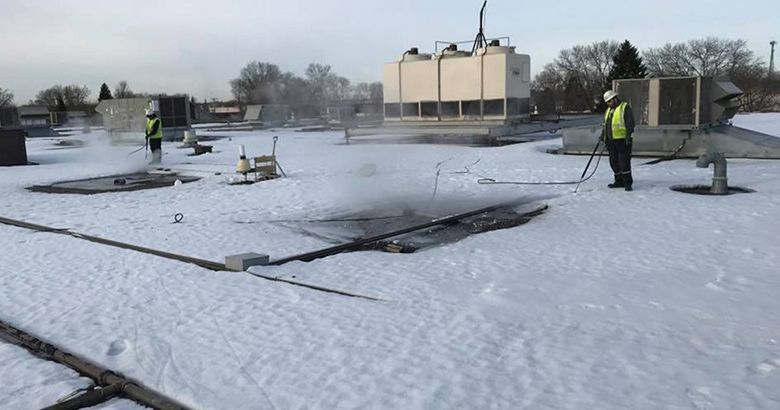 Crew removing ice and snow